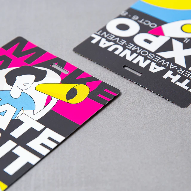 Double-sided custom event badge showing front and back