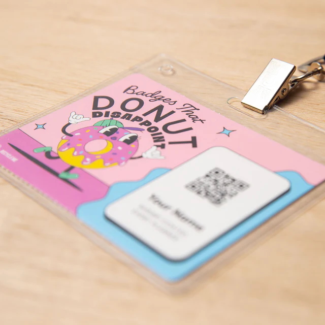 Clear plastic name badge holder with a printed insert