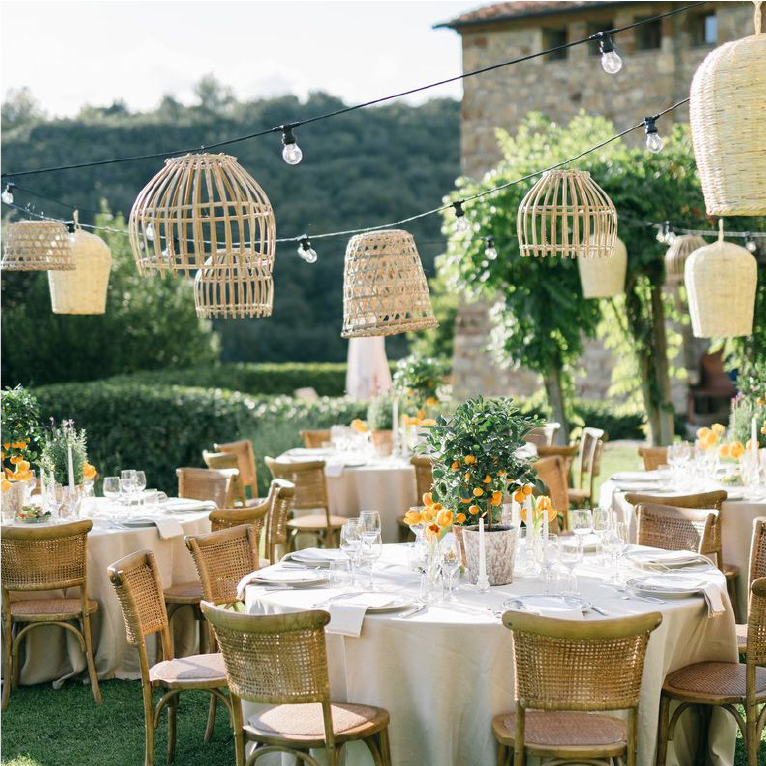 Rattan and wicker furniture in a summer event lounge setting