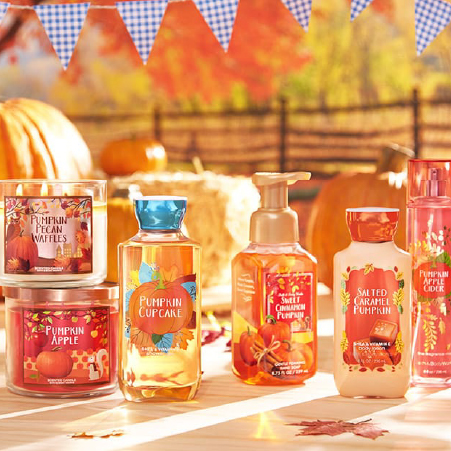 Bath & Body Works fall candles in autumn-themed packaging