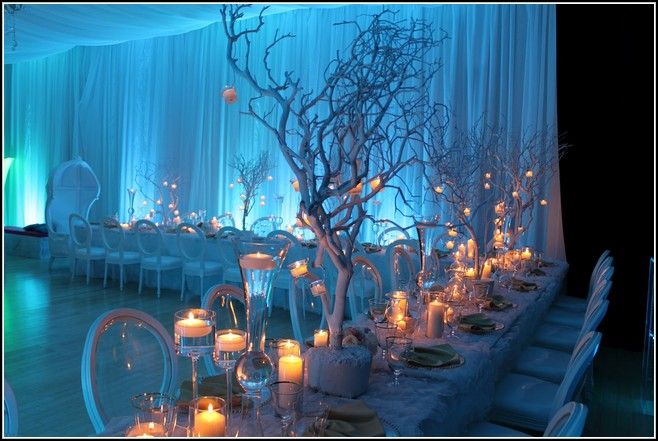 Woodland-themed event with twinkling lights and lush greenery