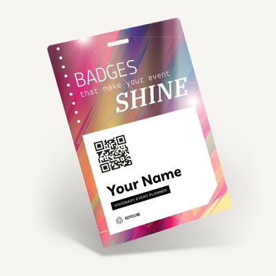 Event badge with metallic gold ink accents catching the light